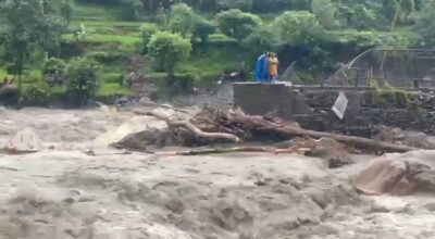 Flood sweeps away Kaski-Parbat linking bridges, three trapped in temple