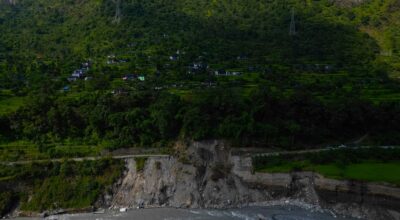 Flood damages Beni-Darbang road, threatens Dukhubesi village